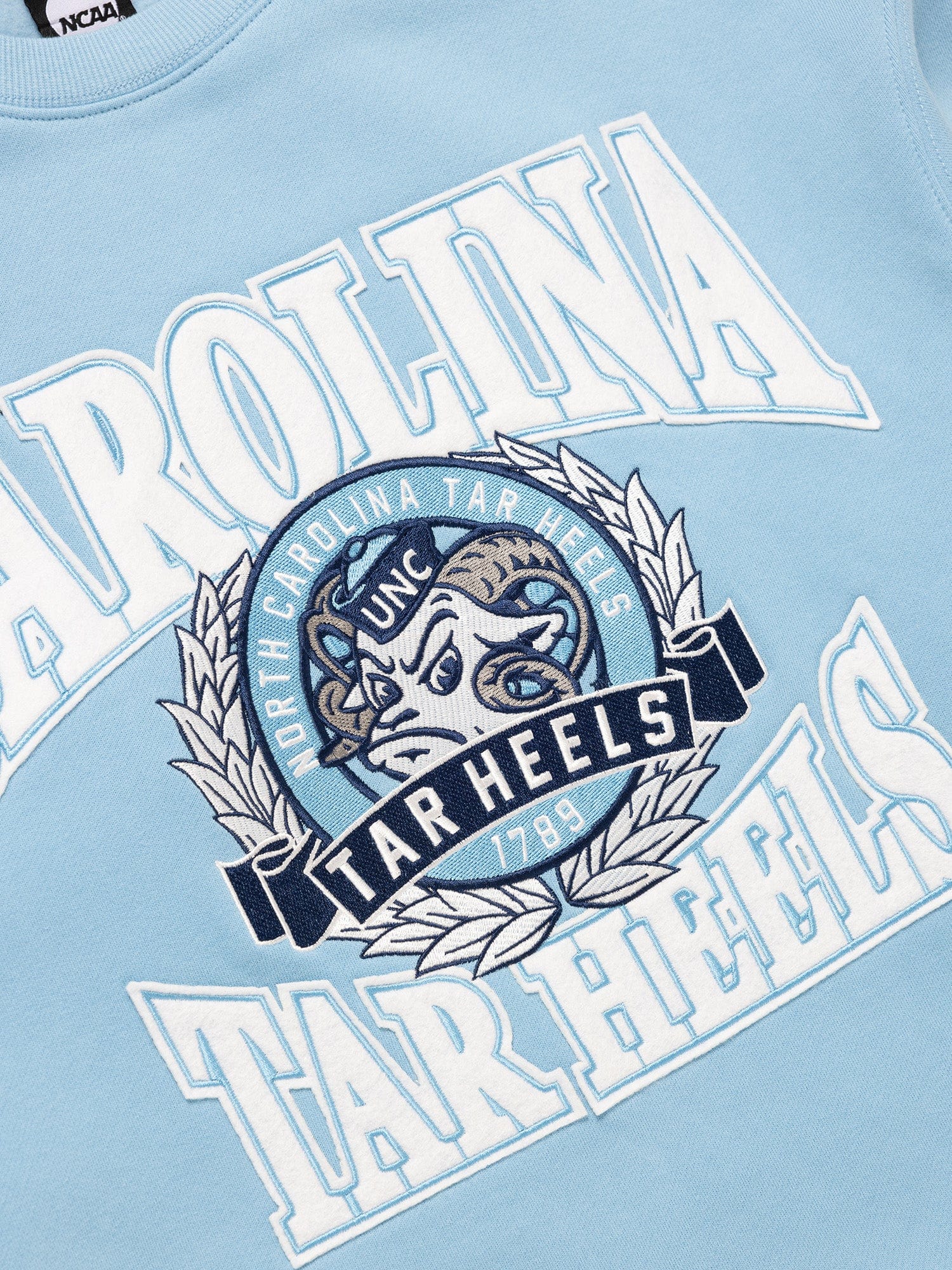 NCAA Branded Jumpers North Carolina Tar Heels NCAA Team Mascot Vintage Crew Jumper - Faded Blue