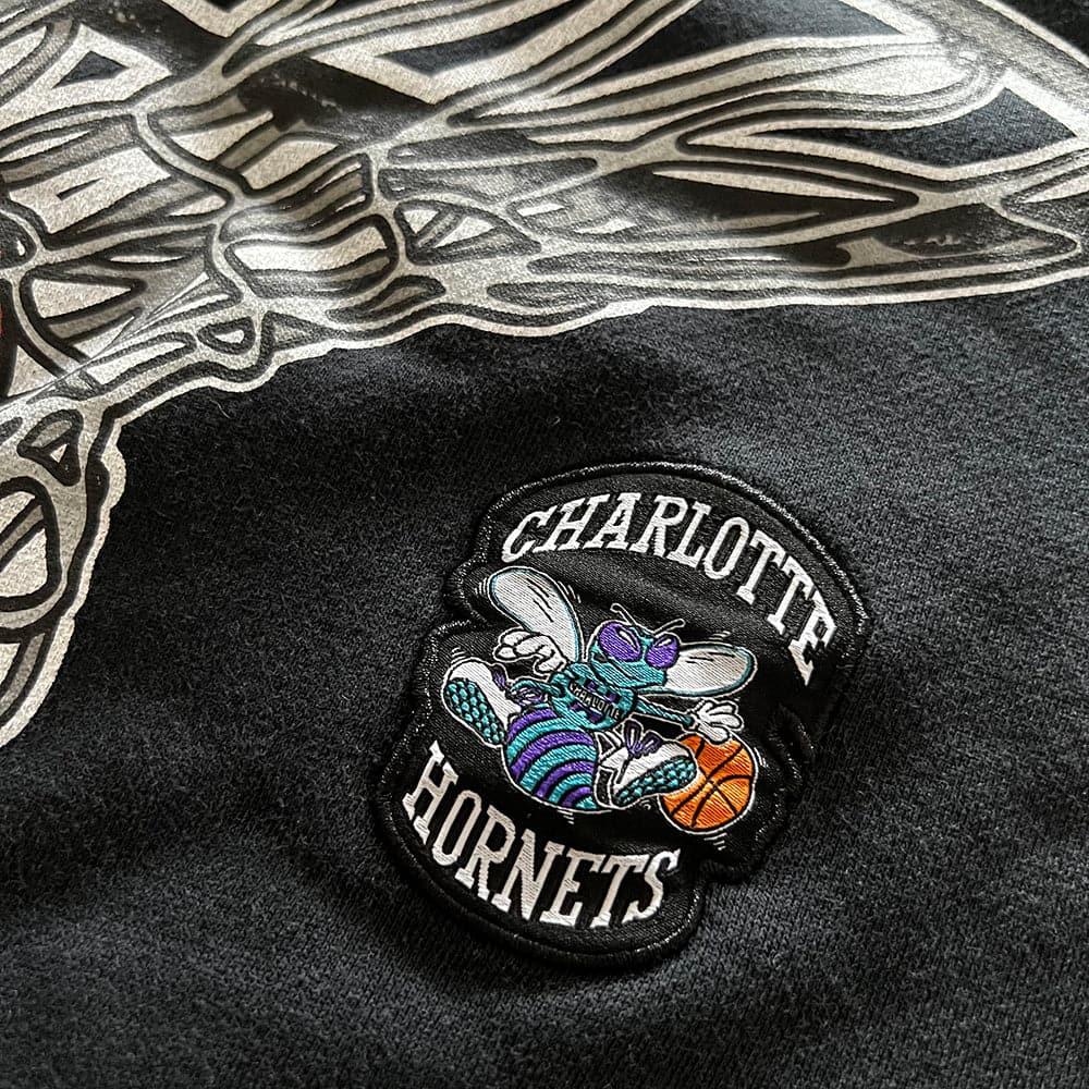 Mitchell And Ness Jumpers Charlotte Hornets Mitchell & Ness NBA Arch Net Vintage Crew Jumper - Faded Black
