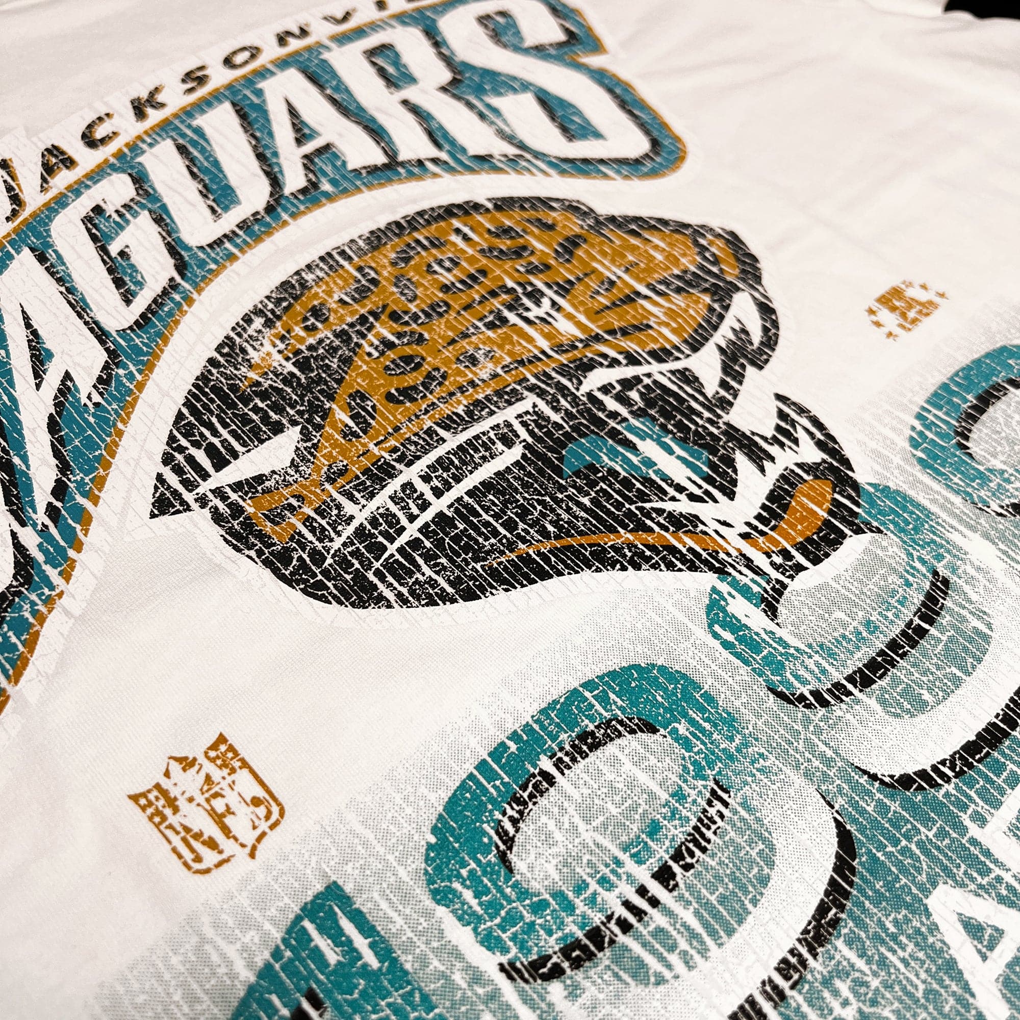 Mitchell And Ness T-Shirts Jacksonville Jaguars Mitchell & Ness NFL 90 Division Vintage T-Shirt - Off White