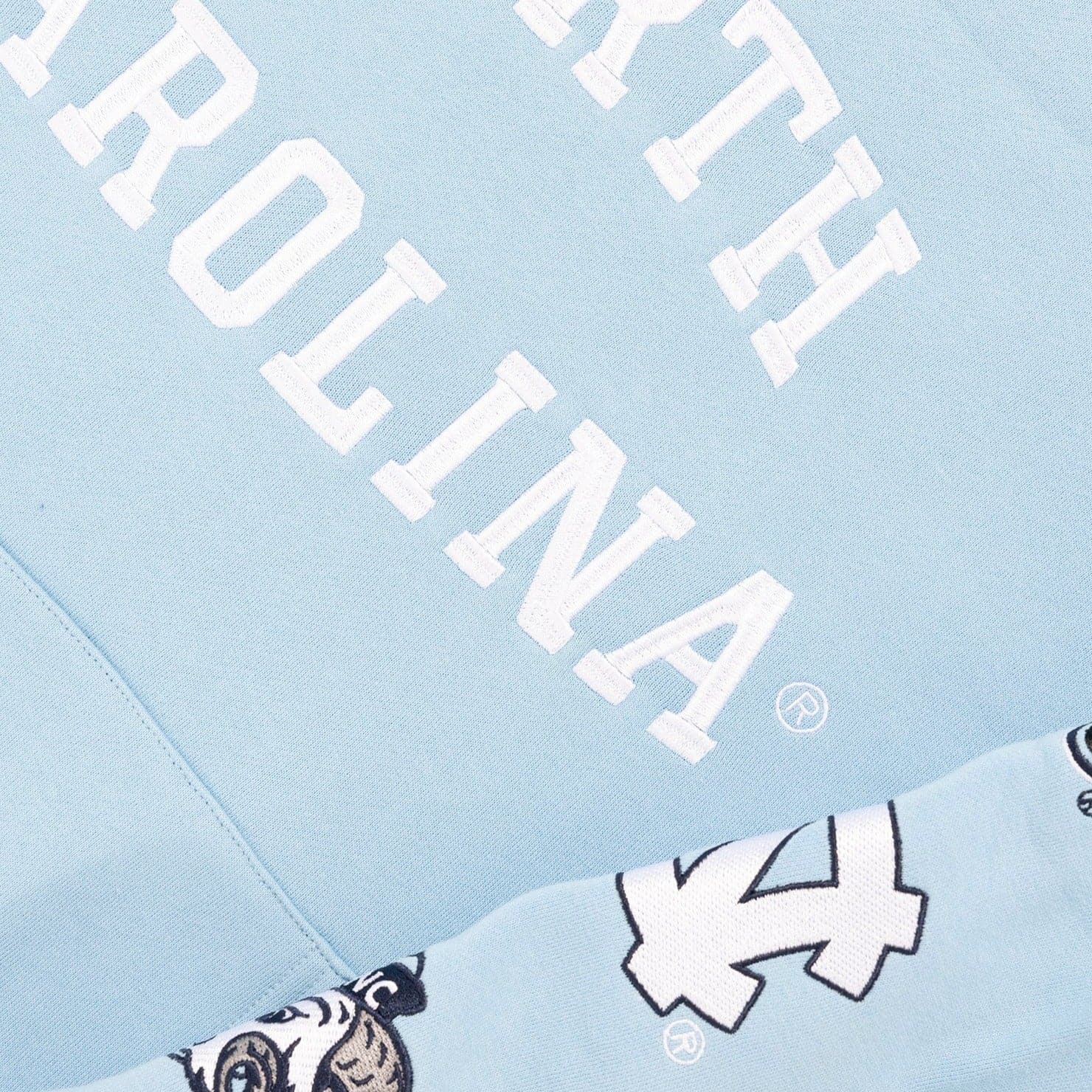 NCAA Branded Jumpers North Carolina Tar Heels NCAA Stamps Vintage Hoodie Jumper - Light Blue